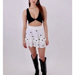 Rock N Rags boutique mini skirt, new with tags, star pattern; fits L-XL